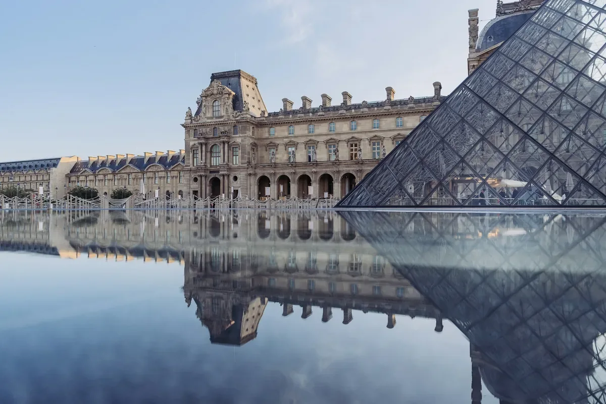 The Louvre pyramid and its reflection