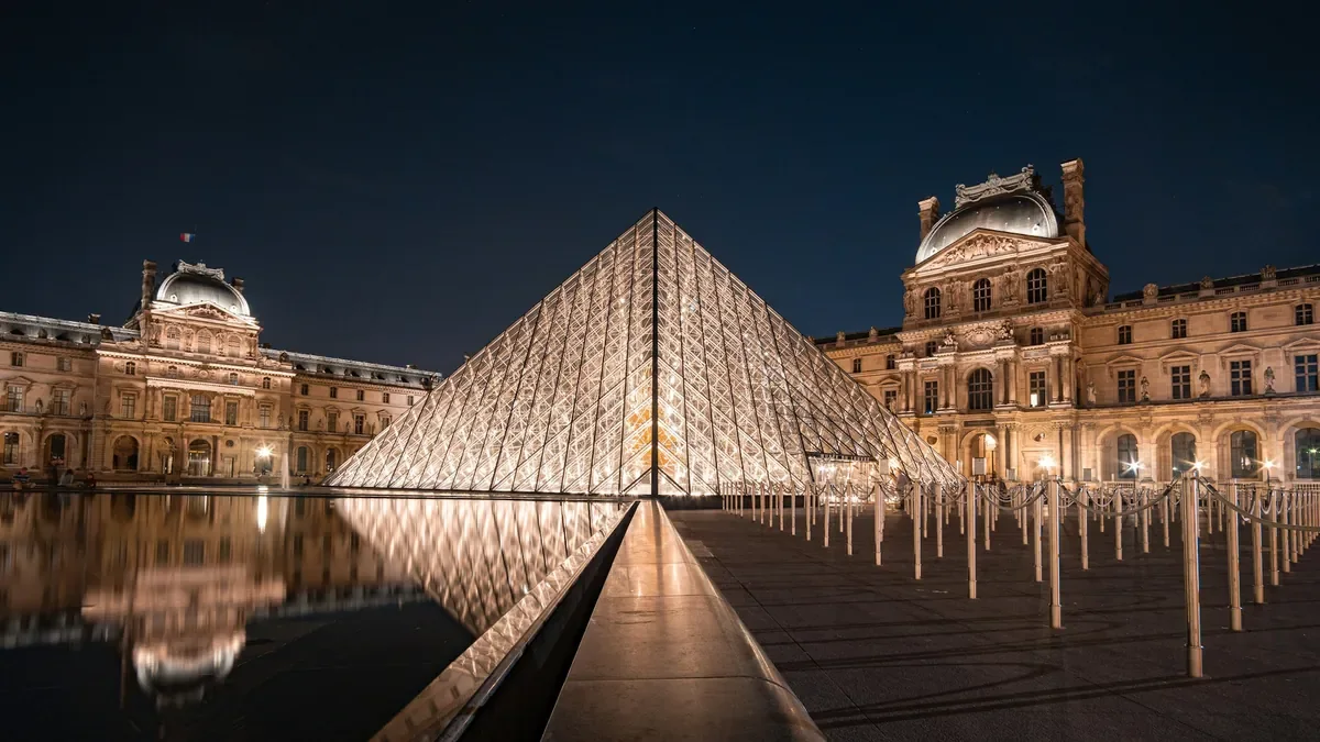The Louvre pyramid lit up in the evening, the start of Day 2 The Louvre pyramid lit up in the evening, the start of Day 2